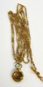 Victorian gold-plated guard chain, ornate link and small glass locket, possibly pinchbeck