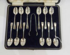 Set of 12 George V silver teaspoons, old English pattern, Birmingham 1912 and the matching claw-