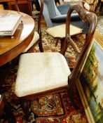 Five Victorian rosewood dining chairs, each with scroll and rosette carved top rail, beaded and