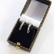 Pair 18ct white gold and diamond hoop earrings