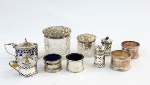 Three-piece silver condiment set with blue glass liners, three other assorted condiment items with