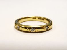 9ct yellow gold and diamond ring, gypsy set with three small stones in diagonal bands , approx 3g