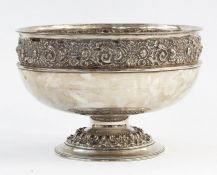 Walker & Hall silver pedestal bowl, circular with floral repousse decoration, Sheffield, 32.85oz