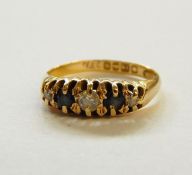 18ct gold, sapphire and diamond ring set three diamonds and two sapphires, in claw setting