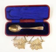 Two Victorian silver decanter labels in the shape of vine leaves, pierced 'Sherry' and 'Madeira',