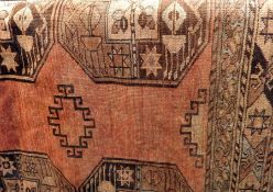 Persian style wool carpet, the red ground with quartered elephant's foot guls , 394 x 250 cms