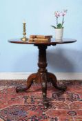 A George II mahogany tripod table