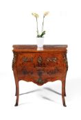 A French kingwood, tulipwood and bois satine serpentine secretaire commode, in Louis XV style