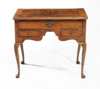 A George II walnut side table