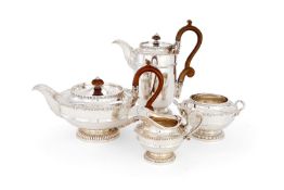 A silver four piece circular tea service by James Dixon & Sons Ltd