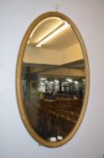 Oval Gilt Framed Bevelled Edge Wall Mirror
