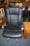 Black Upholstered and Chrome Executive Swivel Offi