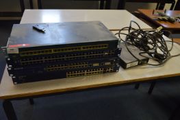 *One Sisco 2950 Series Switch and Three Netgear Sw