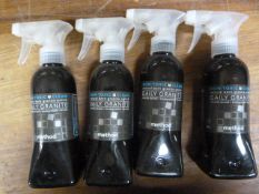 Four Bottles of Granite Polish