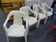 Set of Four White Plastic Garden Chairs