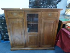 Walnut Cupboard with Central Glass Door