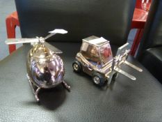 Two Money Boxes, Helicopter and a Fork Lift Truck
