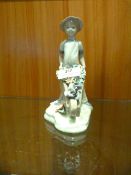 Mediflou Figurine - Young Boy with Wheelbarrow