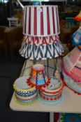Four Assorted Stripe Pattern Lamp Shades and Three