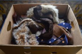 Box of Fur Wraps and Belts