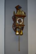 Dutch Weighted Wall Clock with Ornamental Brass Fi