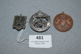 Two Medallions and a Silver Brooch
