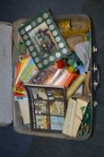 Suitcase and Contents of Christmas Lights, Books,