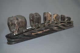 Carved Wood Figurine - Graduating Elephant