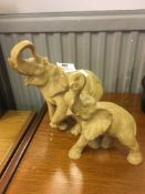 Two Elephant Figurines