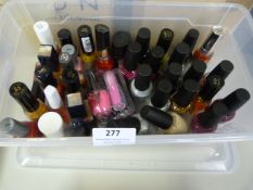 Small Storage Tub Containing Revlon Nail Varnishes