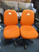 Pair of Orange Upholstered Swivel Office Chairs
