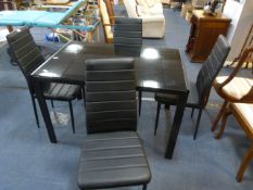 Black Metal Glass Topped Dining Table with Four Le