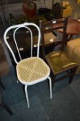 White Metal Dining Chair and an Oak Chair