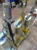 Three Dyson DC01 Vacuum Cleaners