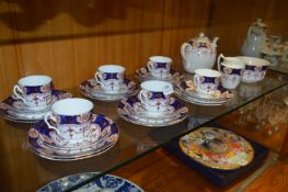 Blue & Gilt Floral Decorated Thirty One Piece Tea