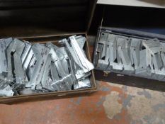 Tin Trunk and a Box Containing Metal Brackets for