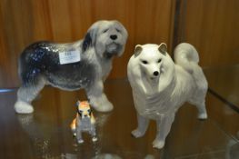 Three Pottery Dog Figurines