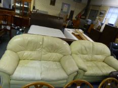 Two Cream Leather Two Seat Sofas