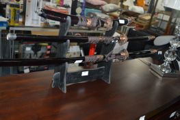 Set of Three Ornamental Samurai Swords on Stand