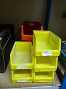 Seven Small Plastic Storage Containers