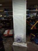 Four Radiators and a Toilet Cistern