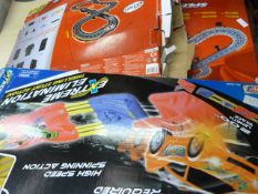 Two Boxes of Speedchaser Fast Lane Track and a Box