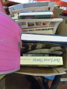 Box Containing Reference Books and a Child's Lapto