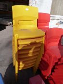Nine Yellow Plastic Children's Chairs