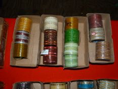 Four Boxes of Assorted Asian and Costume Bangles