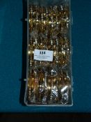 Box Containing 12 Packs of Asian Style Bracelets