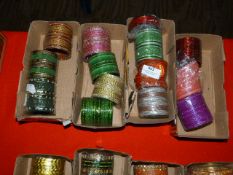 Four Boxes of Assorted Asian and Costume Bangles