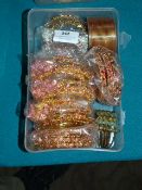 Box Containing 10 Packs of Asian Style Bracelets