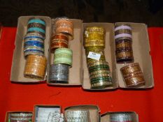 Four Boxes of Assorted Asian and Costume Bangles