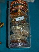 Box Containing 12 Packs of Asian Style Bracelets